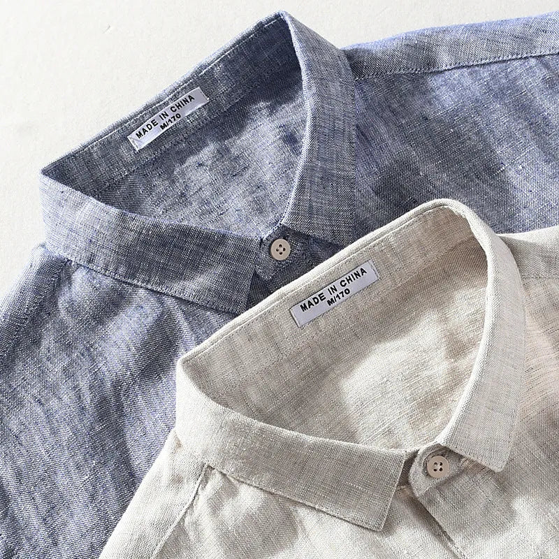Men's raw jute coloured linen shirt with a square collar and short sleeves on a hanger.