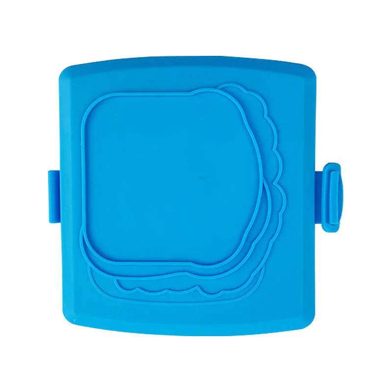 Red silicone baking tray with matching oven gloves set on kitchen counter