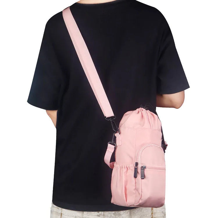 Cloth water bottle shoulder bag with adjustable crossbody strap in black, green, or pink