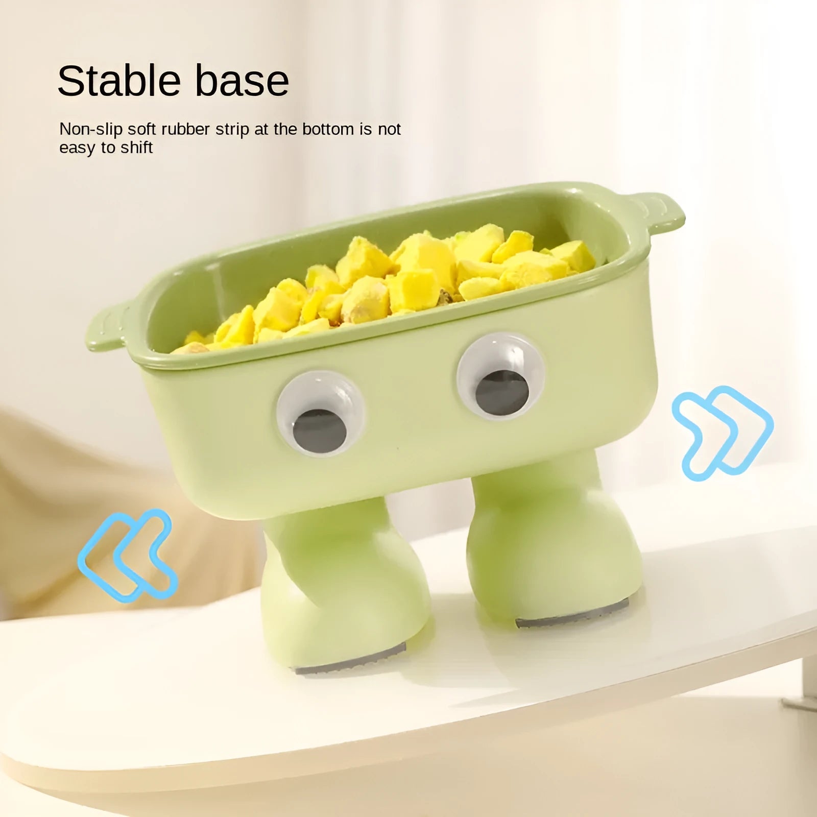 Green elevated cat bowl with robot design, tilted dish, and anti-slip base.