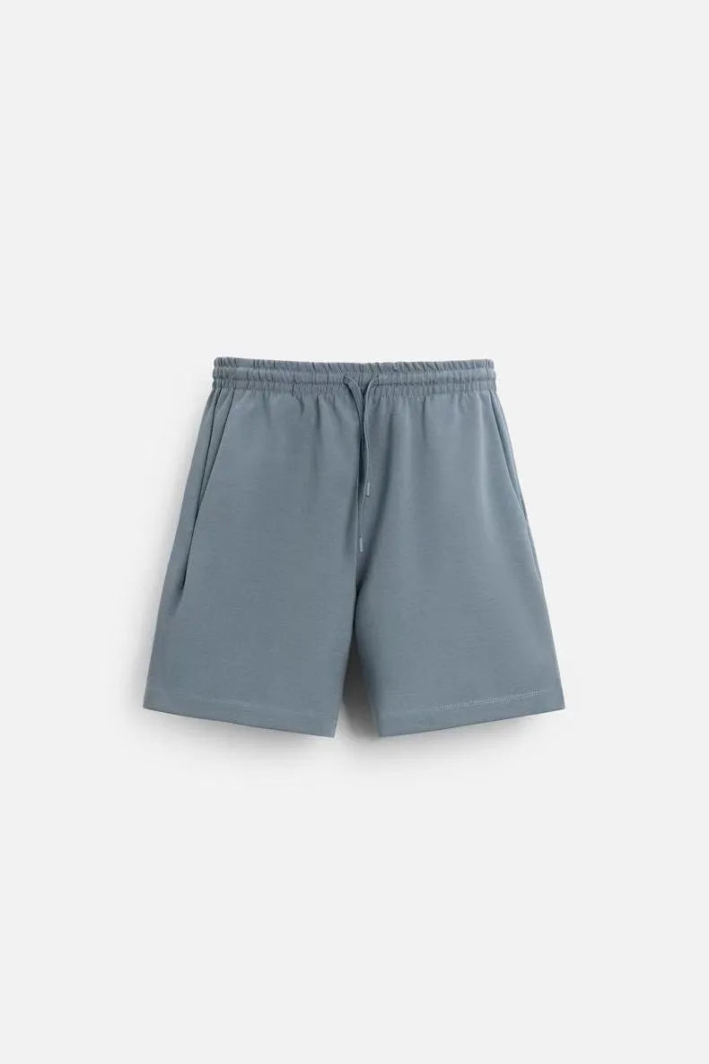 Loose-fitting short sleeve shirt and matching shorts lounge set in blue with double-sided texture