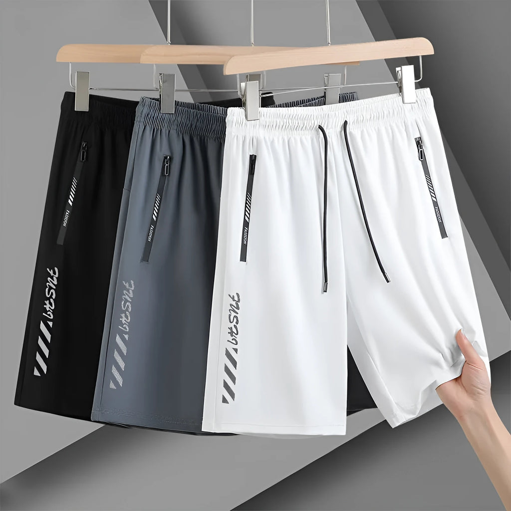 Men's quick-drying nylon sports shorts in loose fit with medium elastic waistband