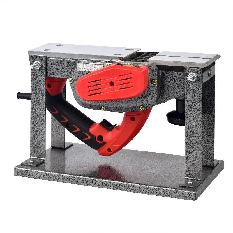Red desktop electric wood planer with aluminium body showing 82mm planing width