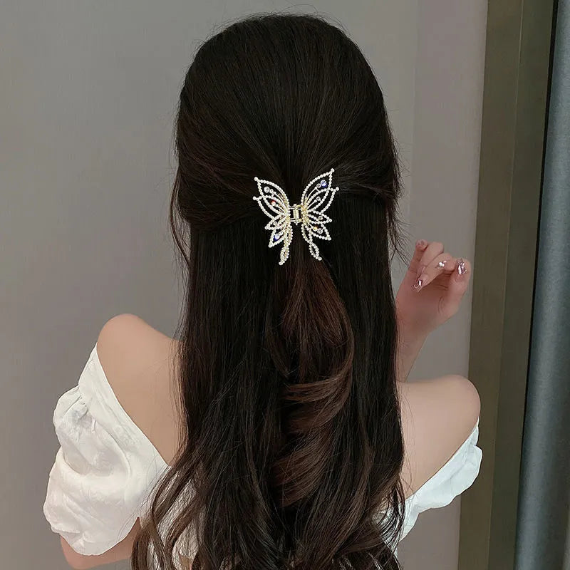 Butterfly design hair barrette for women with alloy construction and decorative rhinestone or pearl styling