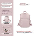 Women's canvas travel backpack in apricot colour showing multiple internal compartments including laptop section