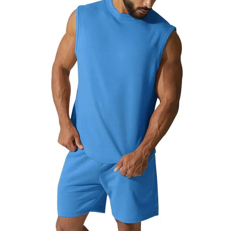 Men's sleeveless cotton blend sports top and matching shorts in a solid colour, laid flat.