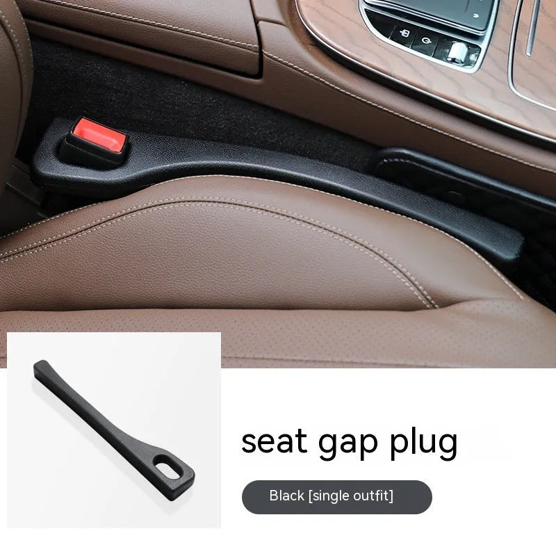Polyurethane car seat gap filler strip in black colour, shown next to a vehicle centre console.