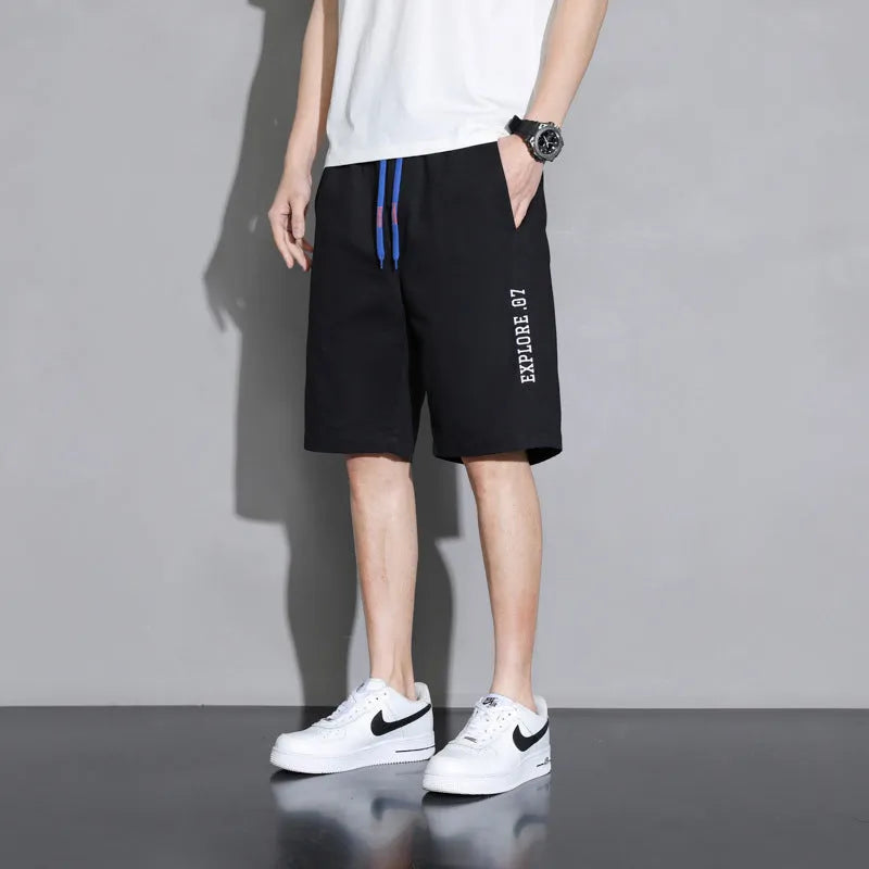 Boys plus size cotton shorts in black, khaki or white, showing mid-waist and shorts length design.