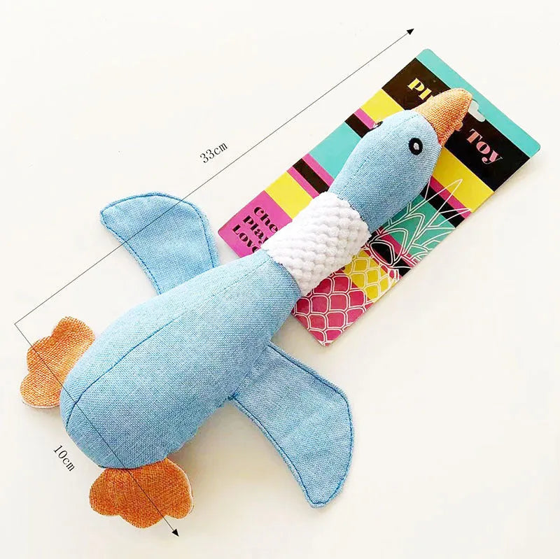 Blue plush duck dog chew toy with two squeakers measuring 33cm by 10cm