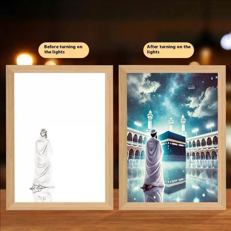 Modern rectangular LED light painting frame showing a sea and home scene on a wall.