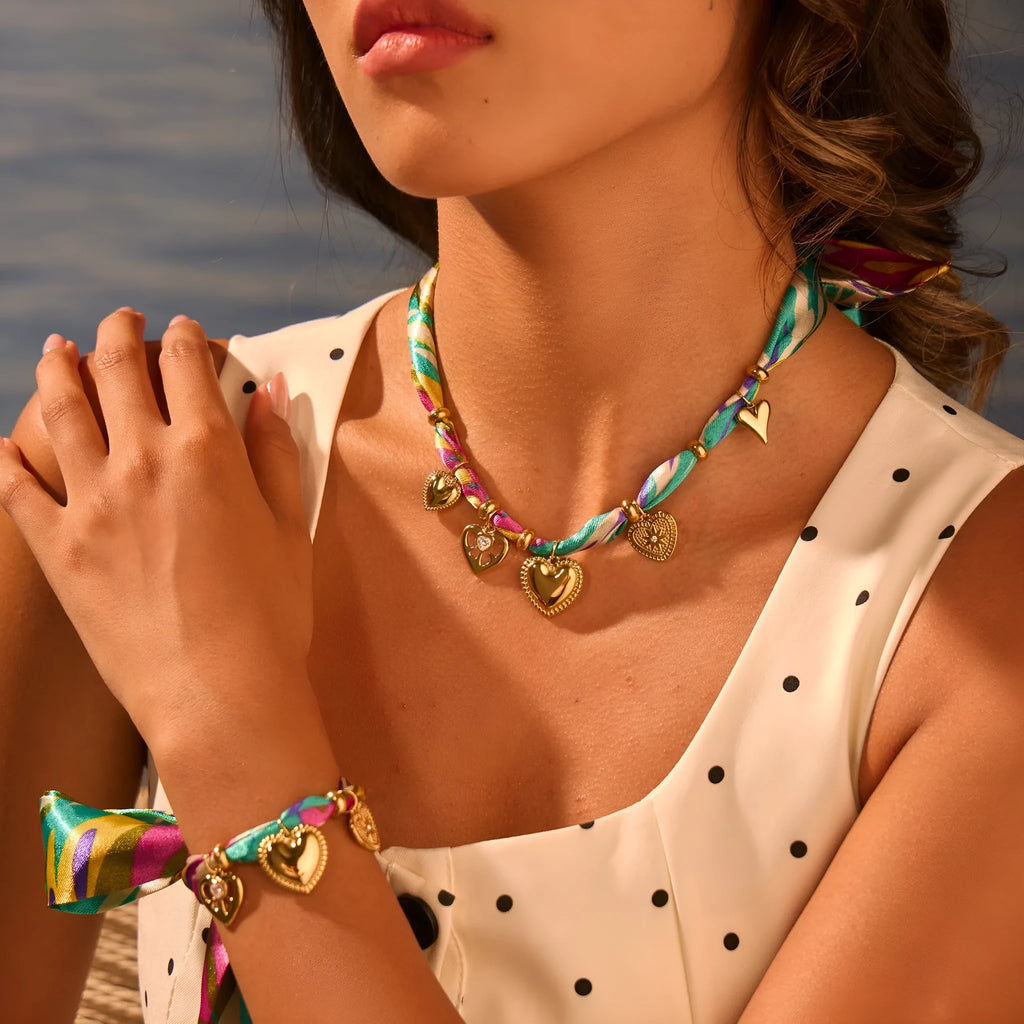 Women's stainless steel geometric pendant necklace and bracelet set with 18K gold electroplated finish