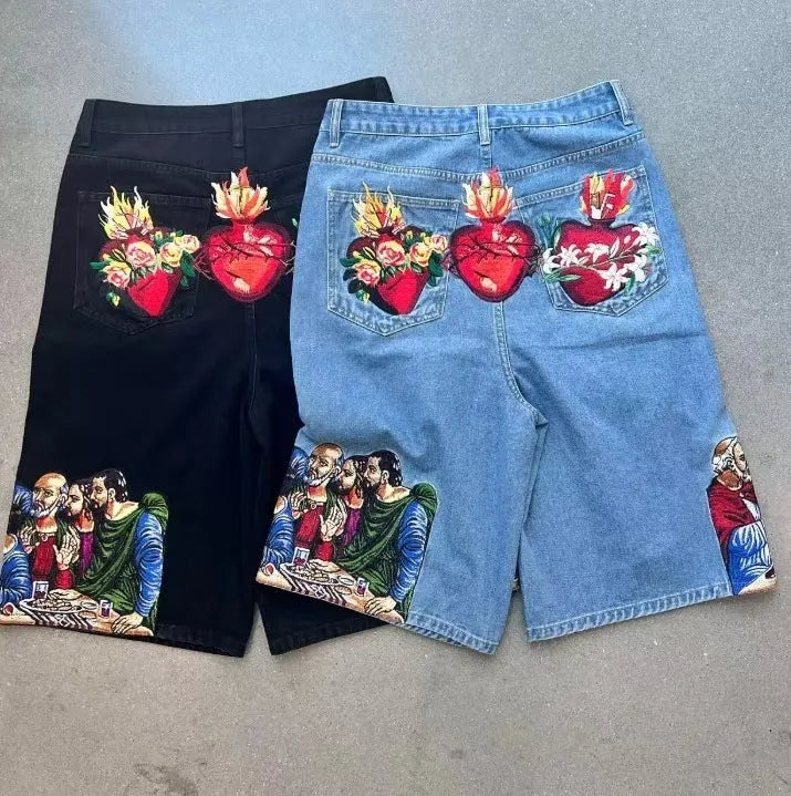 Men's blue cotton shorts with Jesus print on back pocket showing tapered leg design