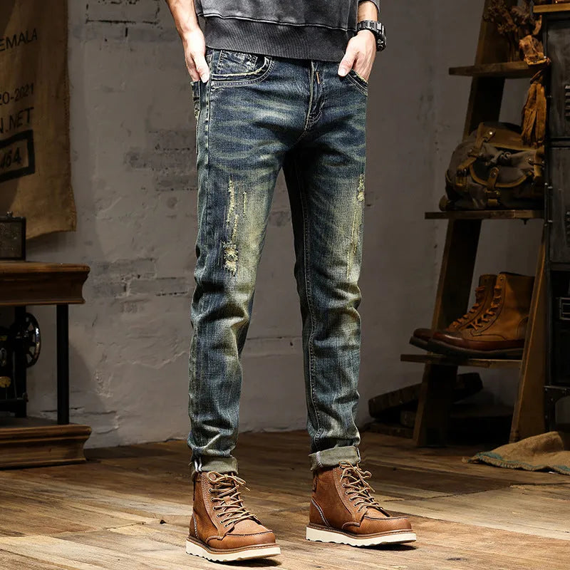 Man wearing retro blue stretch denim skinny jeans with a zip fly.
