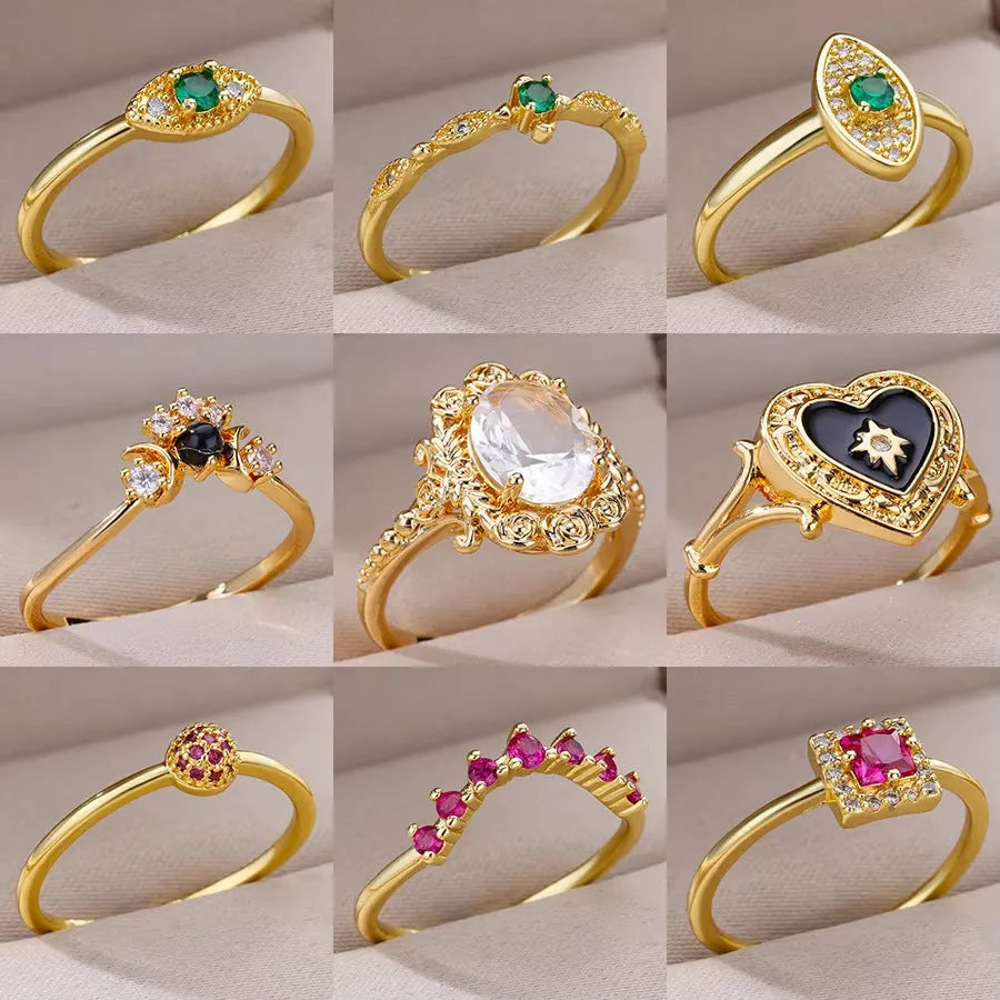 18K gold plated copper open mouth ring with synthetic zircon love emerald motif on white background