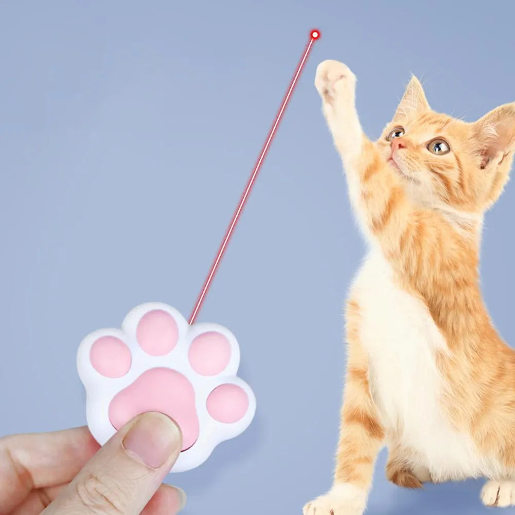 Pink and black USB rechargeable infrared cat teaser toy with key chain attachment