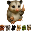 Mini animal-themed vertical middle finger doll ornament in resin and plastic on a desk.