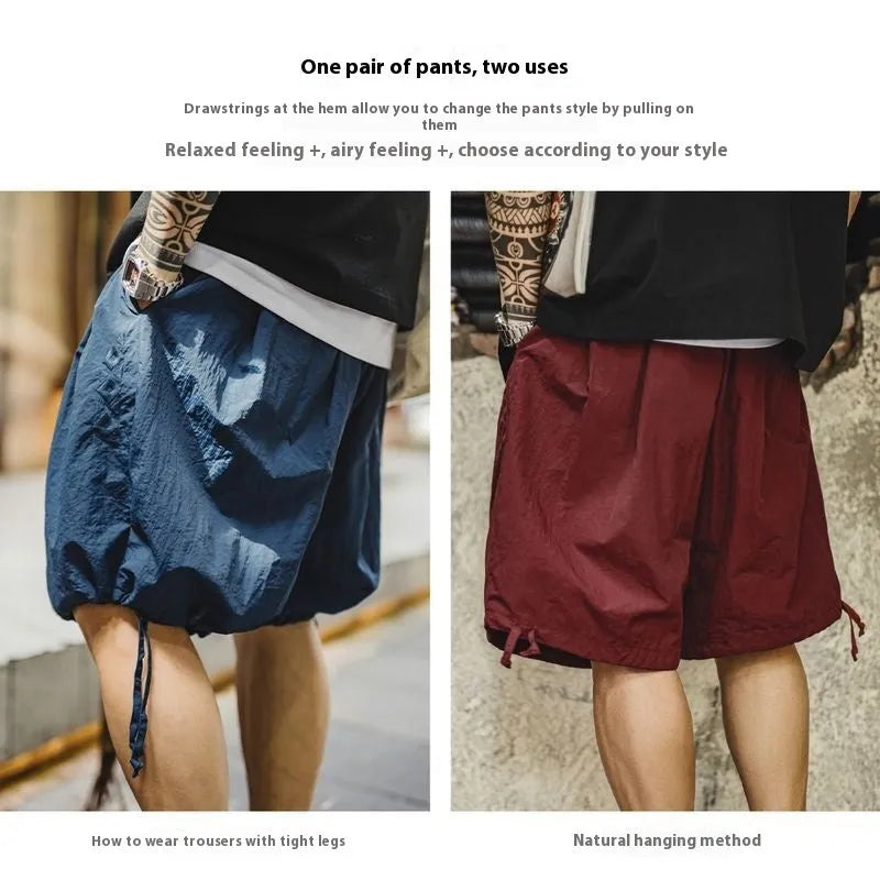 Men's loose fit beach shorts with embroidered design in Prussian Blue colour