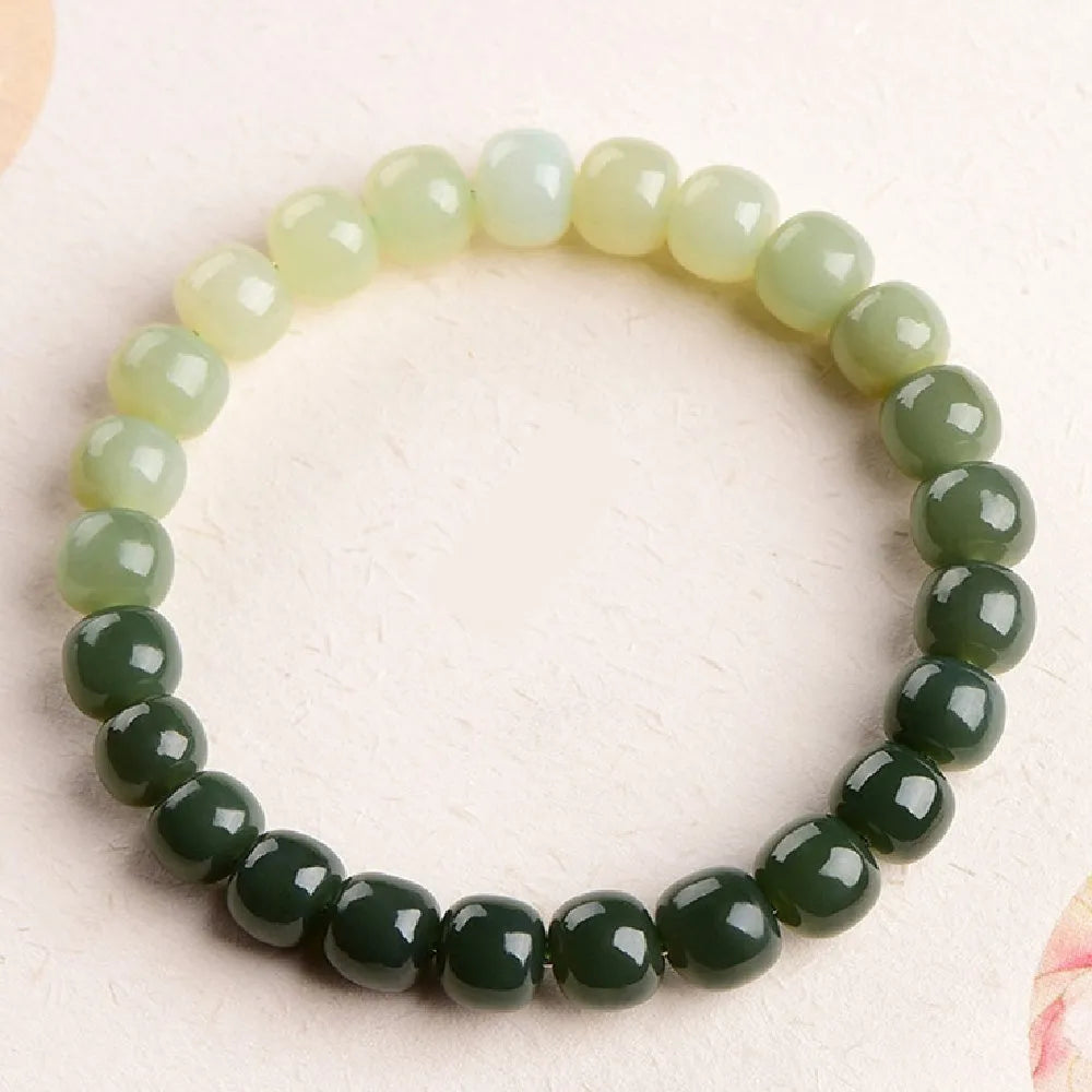 Natural Hetian jade bracelet with gradient clear water colour beads in polished finish