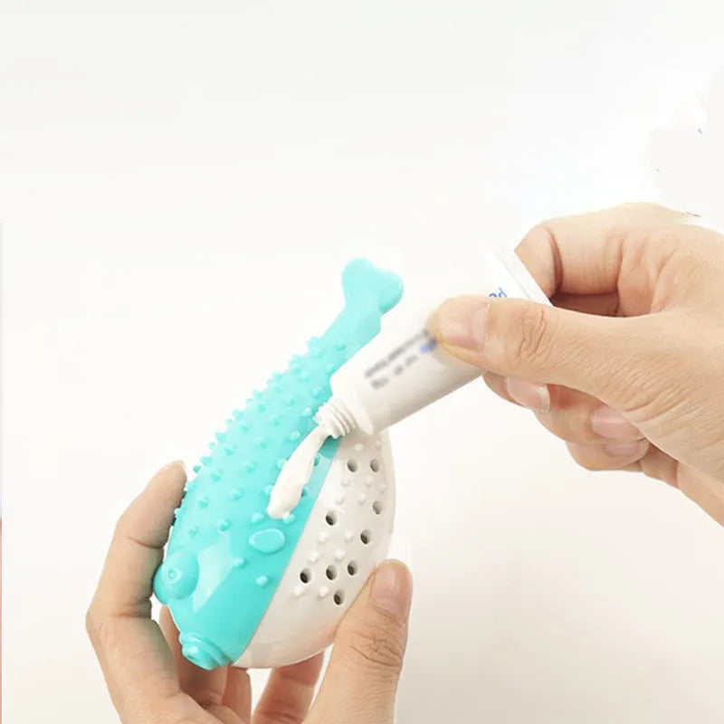 Blue silicone fish-shaped chew toy for cats on a white background.
