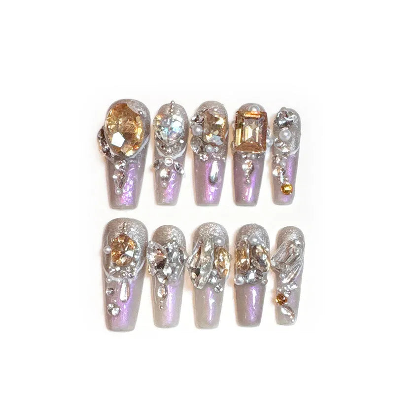 False nail patches set in card packaging with jelly adhesive and tool application options