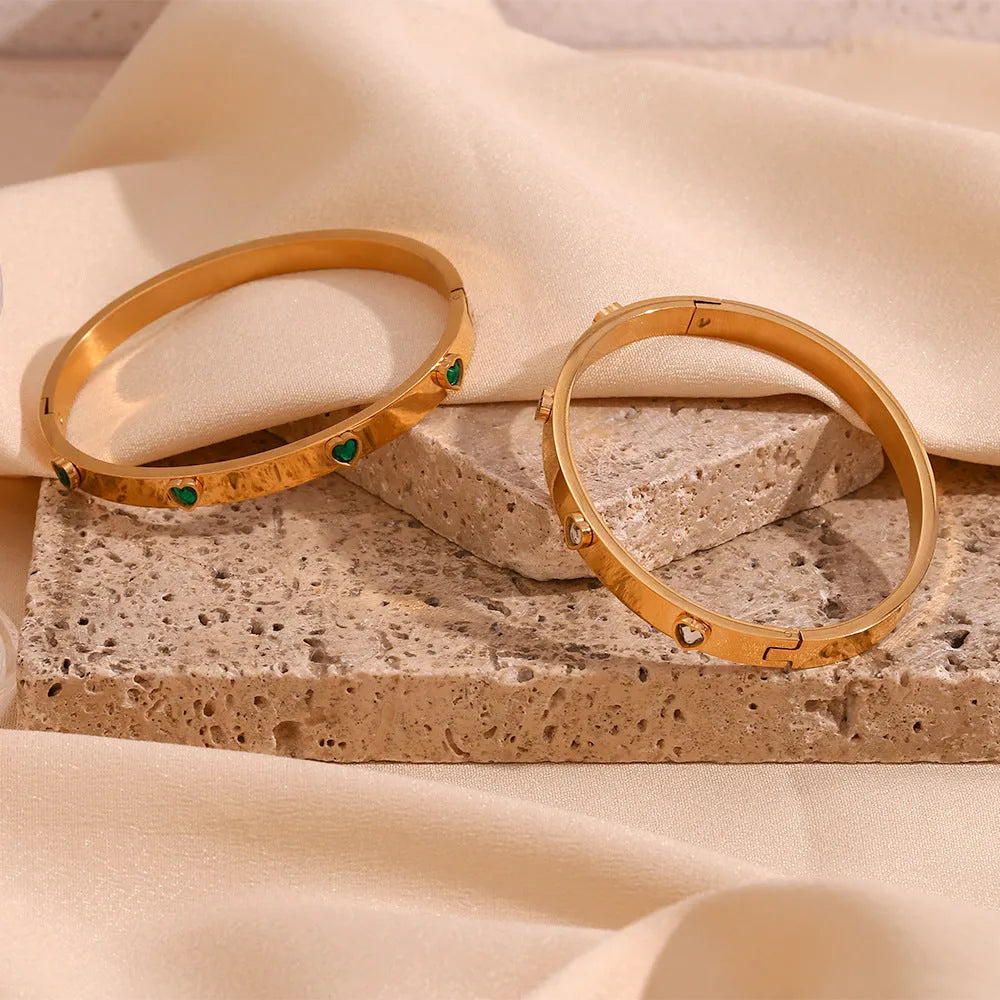 Golden stainless steel bracelet with micro-inlaid peach heart pendant and zircon or diamond accents
