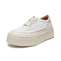 Women's black platform sports board shoes with embossed cowhide upper and lace-up closure