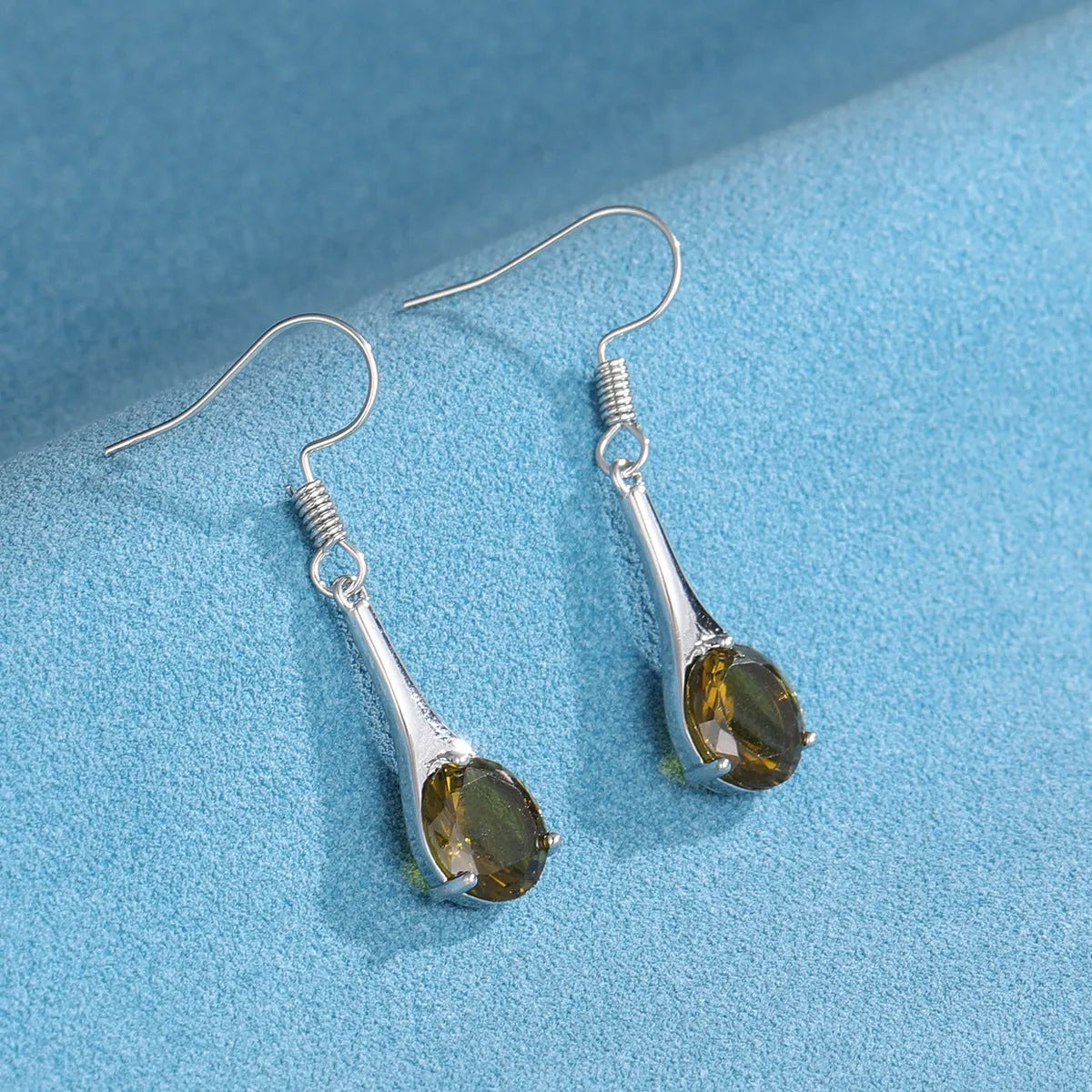 Olive green topaz drop shape earrings with minimalist water drop design