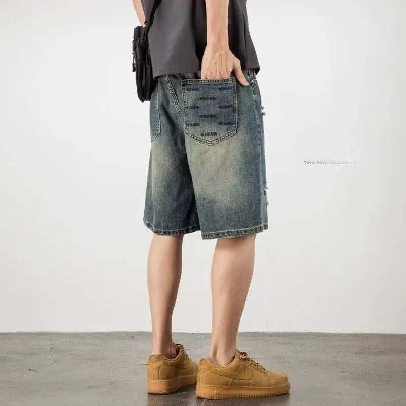 Men's blue retro loose hole denim shorts with straight leg fit