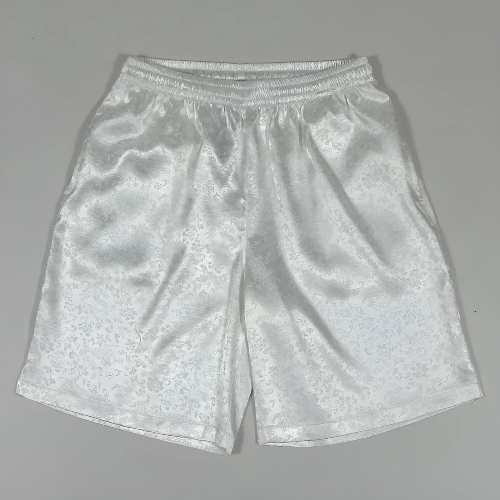 Men's black traditional Chinese Tang suit shorts with elastic waistband.