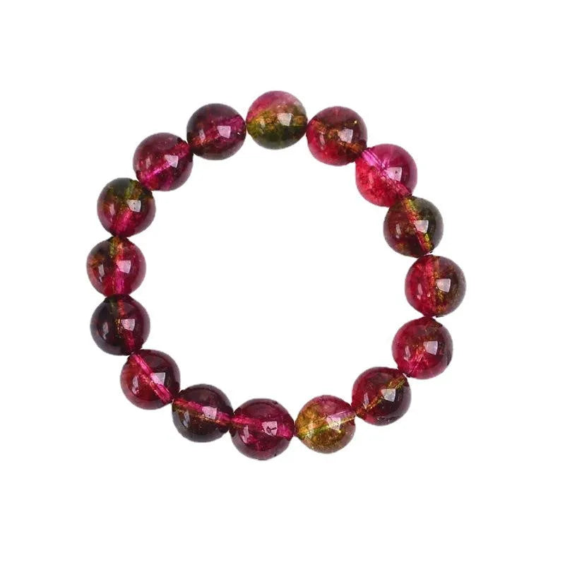 Handmade watermelon crystal bracelet for women on a wrist, showing pastoral design details.