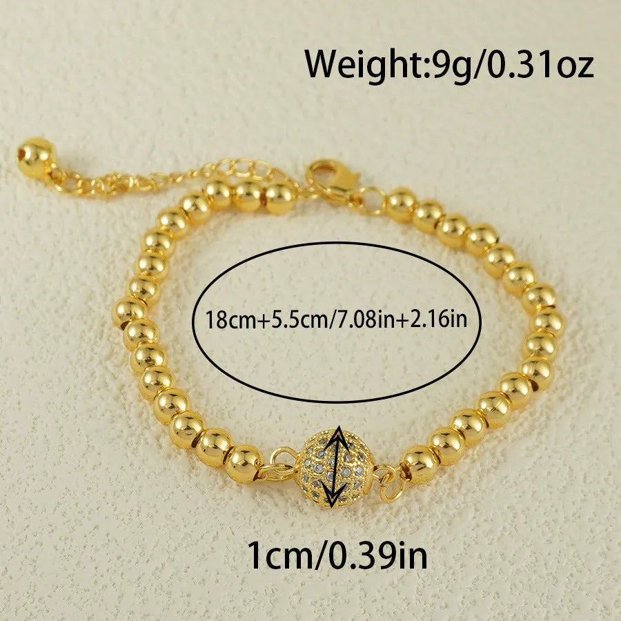 Women's copper bracelet with zircon Arabic styling and heart-shaped pendant on wrist