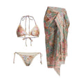 Creamy-white floral patterned women's three-piece bikini set with skirt.