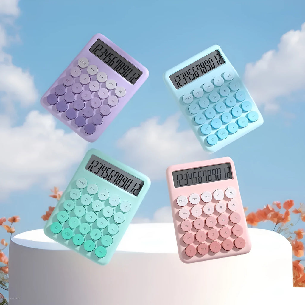 Gradient colour desk calculator in violet, cherry blossom pink, glacier blue, and mint green on a white desk.