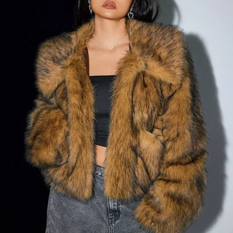 Women's short length artificial fur coat with a fur collar in a black tip on black background colour.