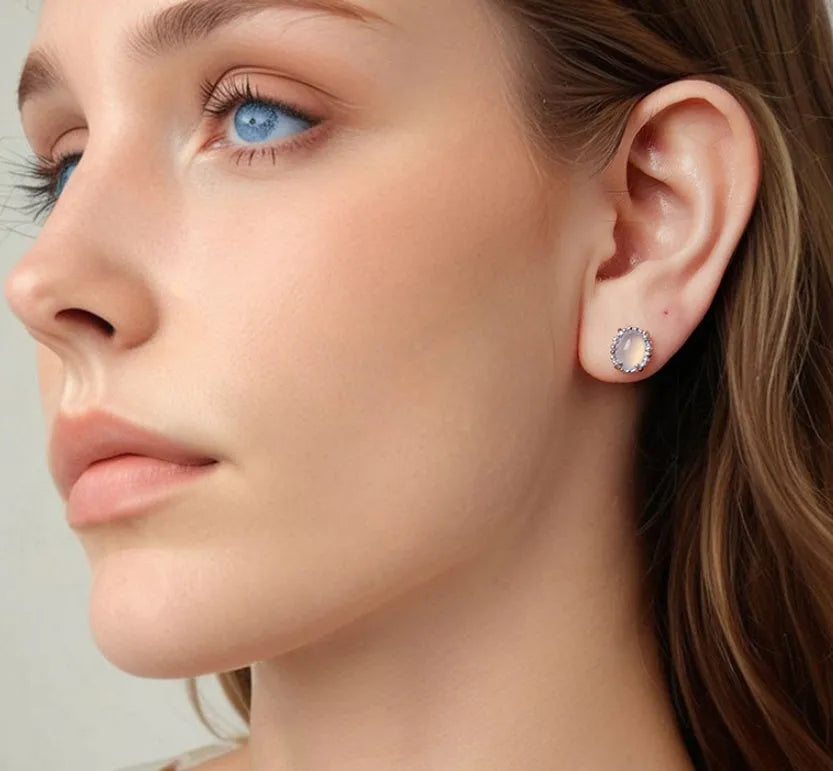 Sterling silver 925 magic stone ellipse stud earrings with French romantic style and electroplated finish