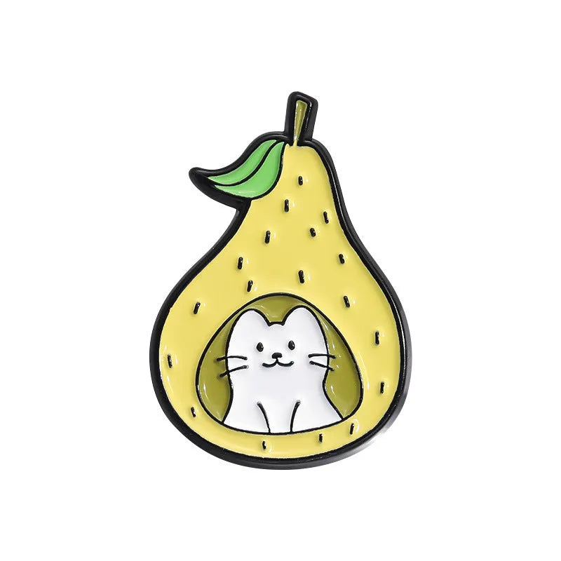 Colourful cartoon fruit design zinc alloy brooch pin on a fabric background.