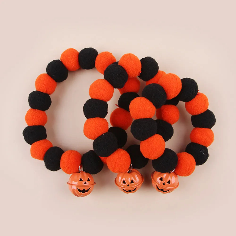 Halloween cat collar with orange pumpkin decoration and plastic buckle closure