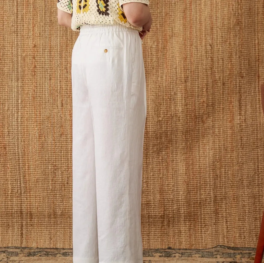 Linen high waist trousers with elasticated waistband and lace detail in navy blue, white, or greige colours
