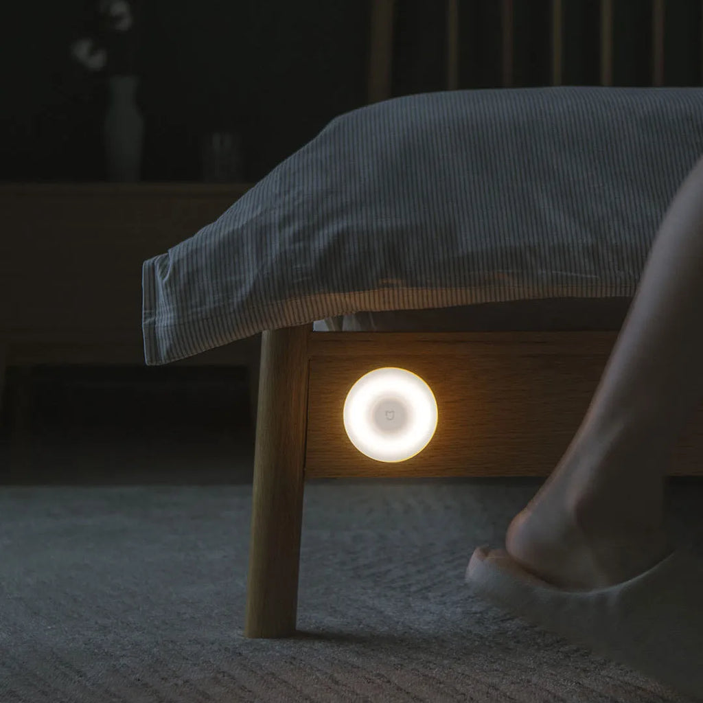 White square Mijia Bluetooth bedside table lamp with motion sensor on a wooden nightstand.