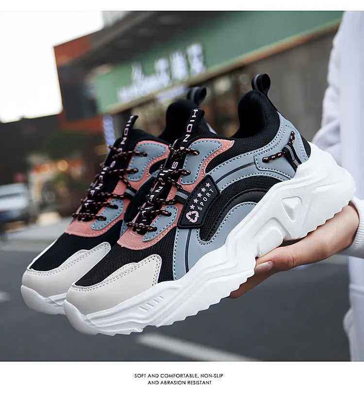 White women's casual mesh sports shoes with a buckle and thick sole.