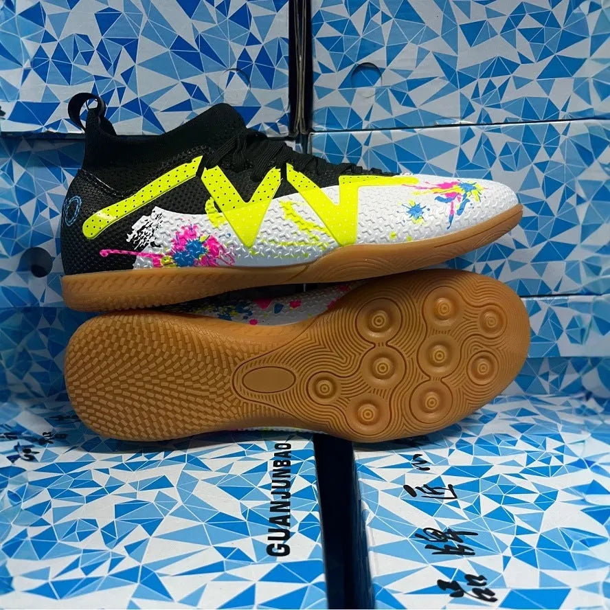 Low-top adult football boots with replaceable studs in Black & Yellow, White Black, and White Powder colour options.