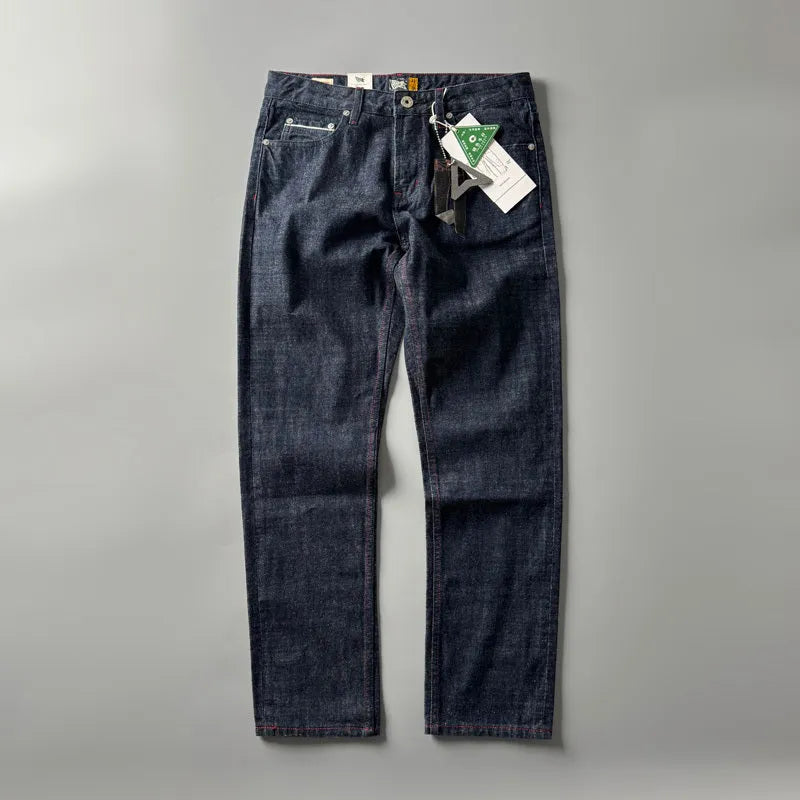 Men's primary colour straight leg jeans in American retro style laid flat, showing the mid waist and full-length leg.