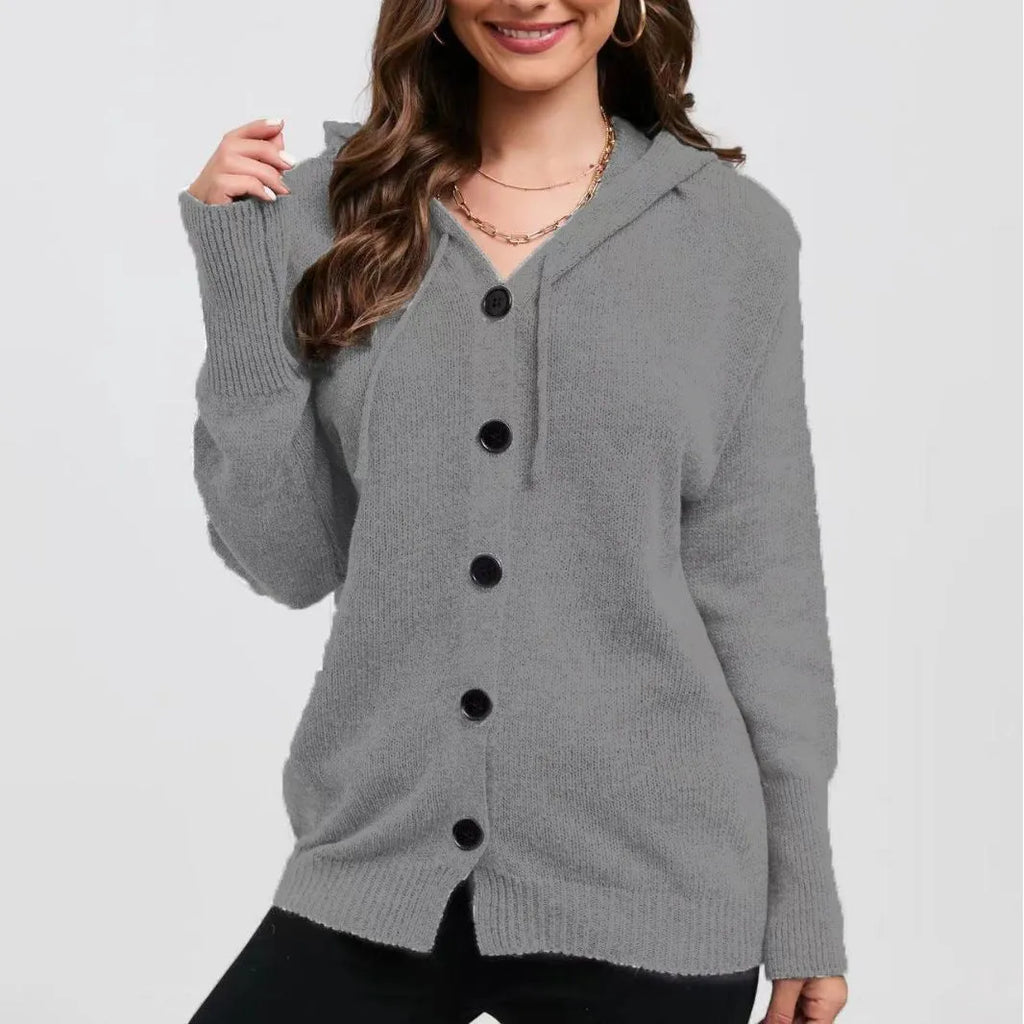 Women's solid colour hooded cardigan sweater in thick cotton fabric showing loose fit and regular sleeves