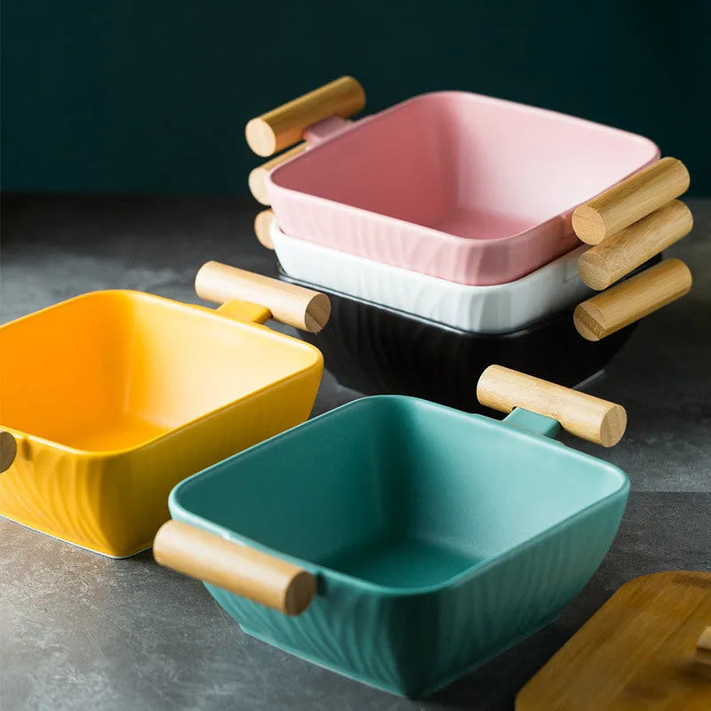 Ceramic bowl with irregular shape and matching lid in heat-resistant porcelain