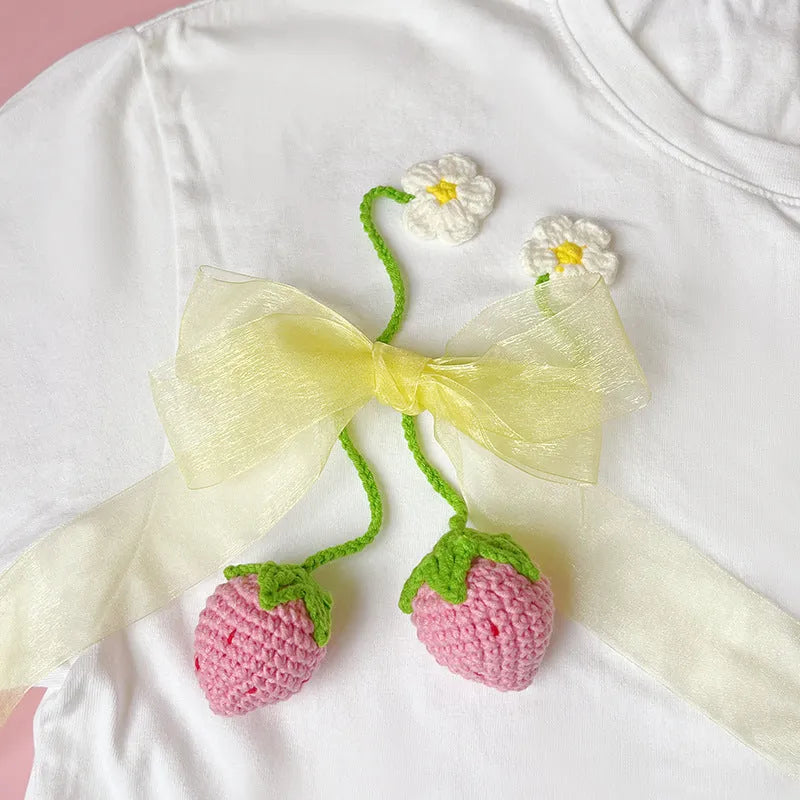 Handmade wool crochet woven strawberry pendant on 35cm cord, available in red or pink colours