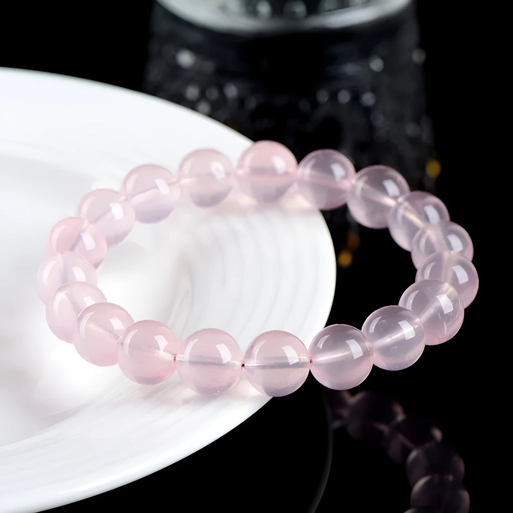 Natural starlight crystal round bead bracelet with pink star colour options and measured bead sizing