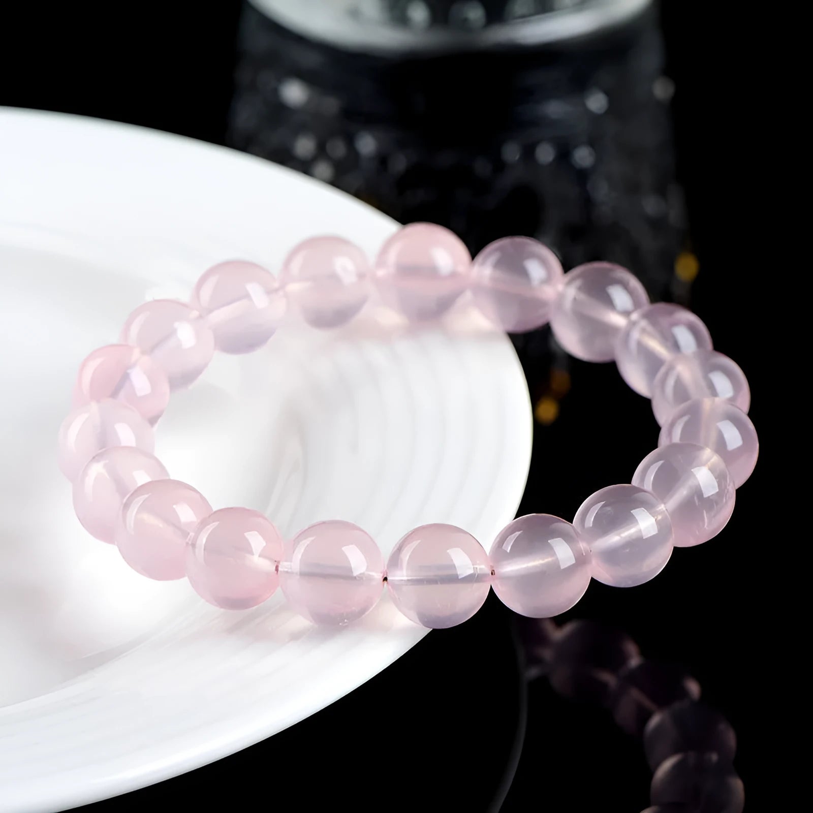 Natural starlight crystal round bead bracelet with pink star colour options and measured bead sizing