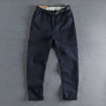 Men's cotton work trousers with buckle belt in khaki colour showing three-dimensional cutting