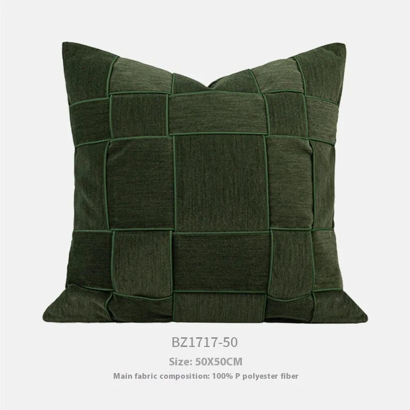 50cm square chenille woven pillow cushion in a choice of seven colours on a sofa.