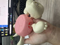 Turtle shaped plastic coaster in green, yellow, and wheat starch colours for heat insulation.
